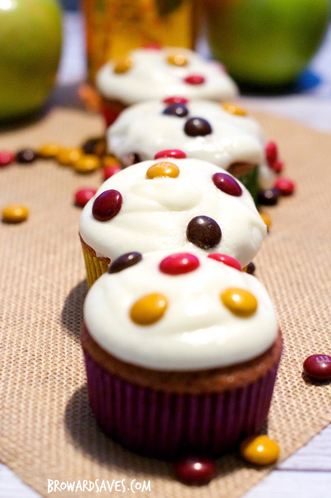 This amazing apple chocolate spiced cupcakes are topped with homemade cider frosting and delicious m&m's. The perfect kid-friendly dessert for fall!