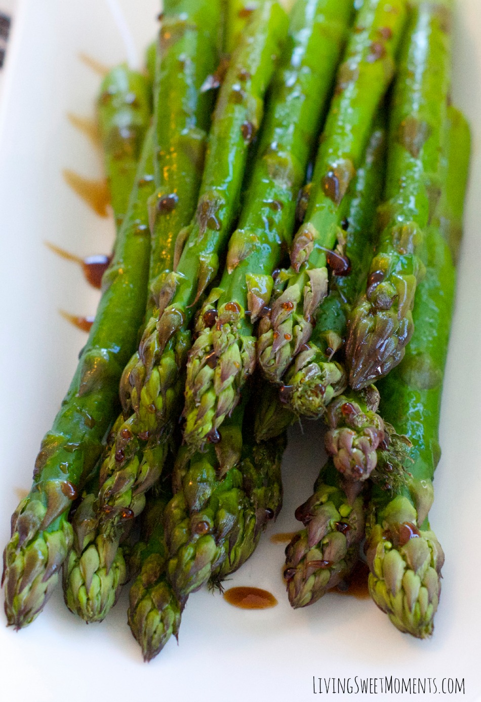This delicious Lemon Balsamic Asparagus Recipe is perfect for a quick and healthy side dish weeknight meal. It's tangy, sweet and very flavorful. 