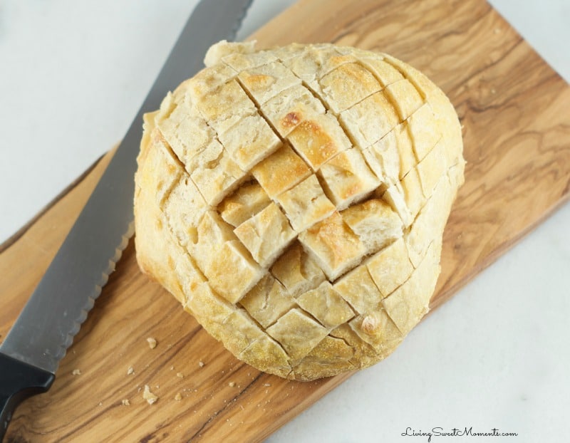 This delicious cheesy bacon Pull Apart Bread Recipe is so easy to make with oozy brie and smoked bacon. The perfect appetizer for the Superbowl. My favorite!