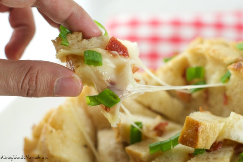 This delicious cheesy bacon Pull Apart Bread Recipe is so easy to make with oozy brie and smoked bacon. The perfect appetizer for the Superbowl. My favorite!