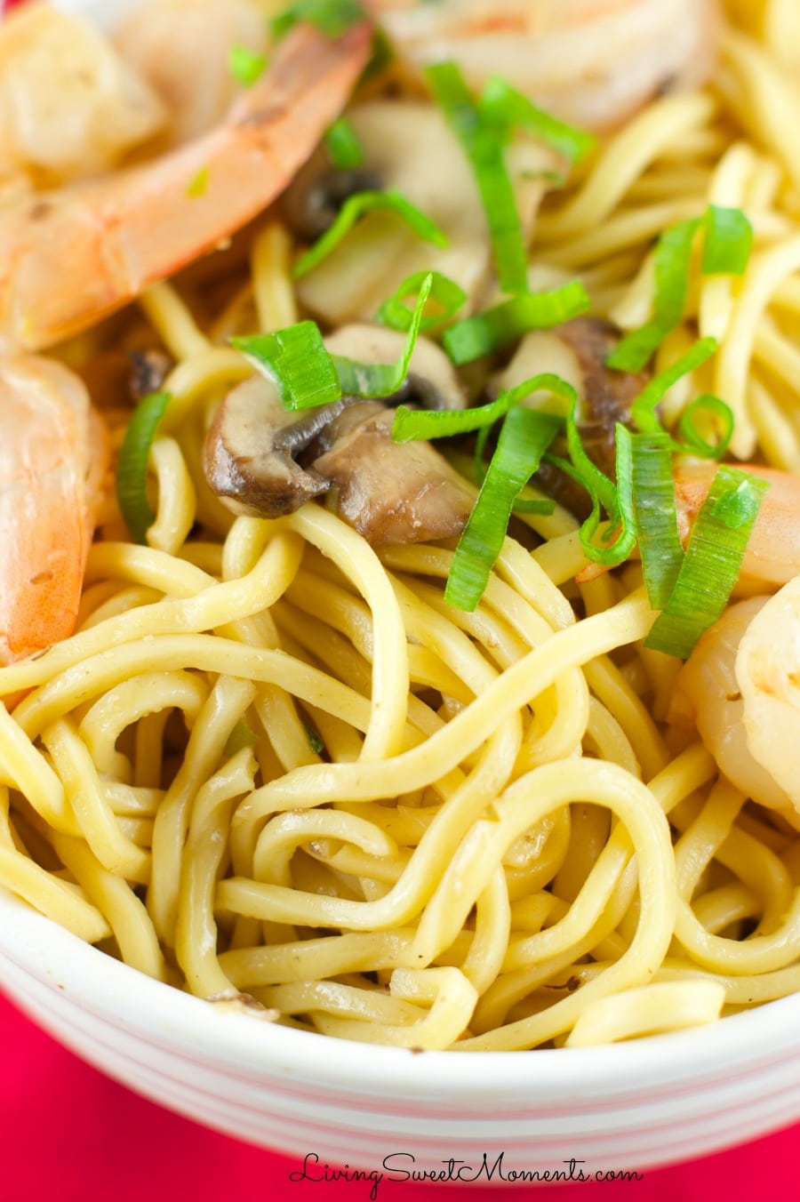 Sesame Shrimp Noodles - Easy and delicious weeknight dinner idea. Shrimp and mushrooms tossed together with egg noodles with a delicious sesame sauce. Definitely a crowd pleaser