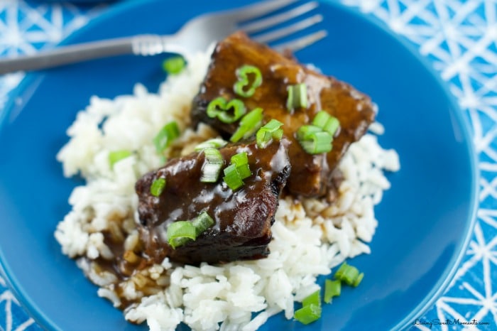 asian style short ribs - made in the slow cooker. Super easy to prepare and a delicious weeknight dinner recipe. The short ribs are fall off the bone tender