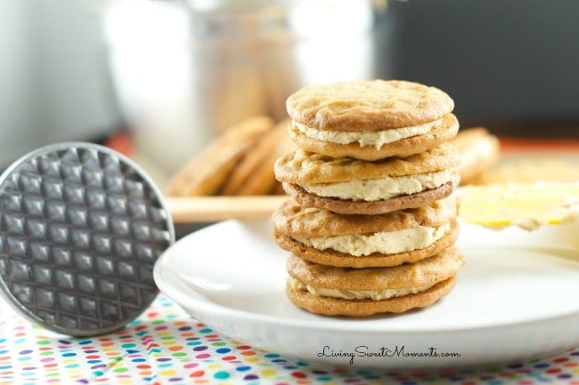 Copycat Nutter Butter Cookies - these homemade peanut butter cookies filled with delicious creamy peanut frosting are more delicious than the original kind.