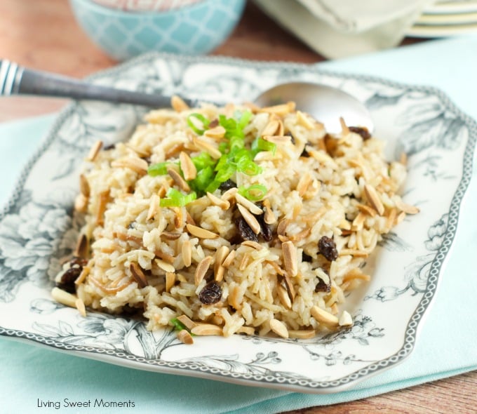 Coca Cola Rice Recipe : This delicious latin rice made with coca cola is topped with raisins and toasted almonds. Great and easy side dish to any meal. Yum!