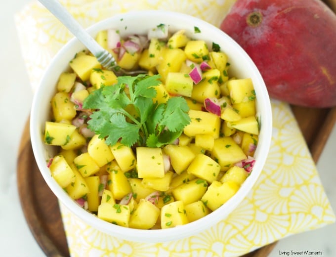 Mango Salad - Just 4 ingredients, this mango salad is the perfect summer recipe for the outdoors. Easy to make and delicious. Serve it as an app or w/chips.