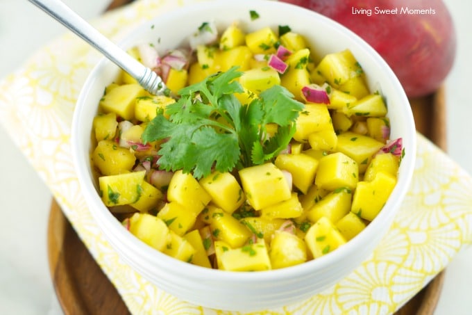 Mango Salad - Just 4 ingredients, this mango salad is the perfect summer recipe for the outdoors. Easy to make and delicious. Serve it as an app or w/chips.