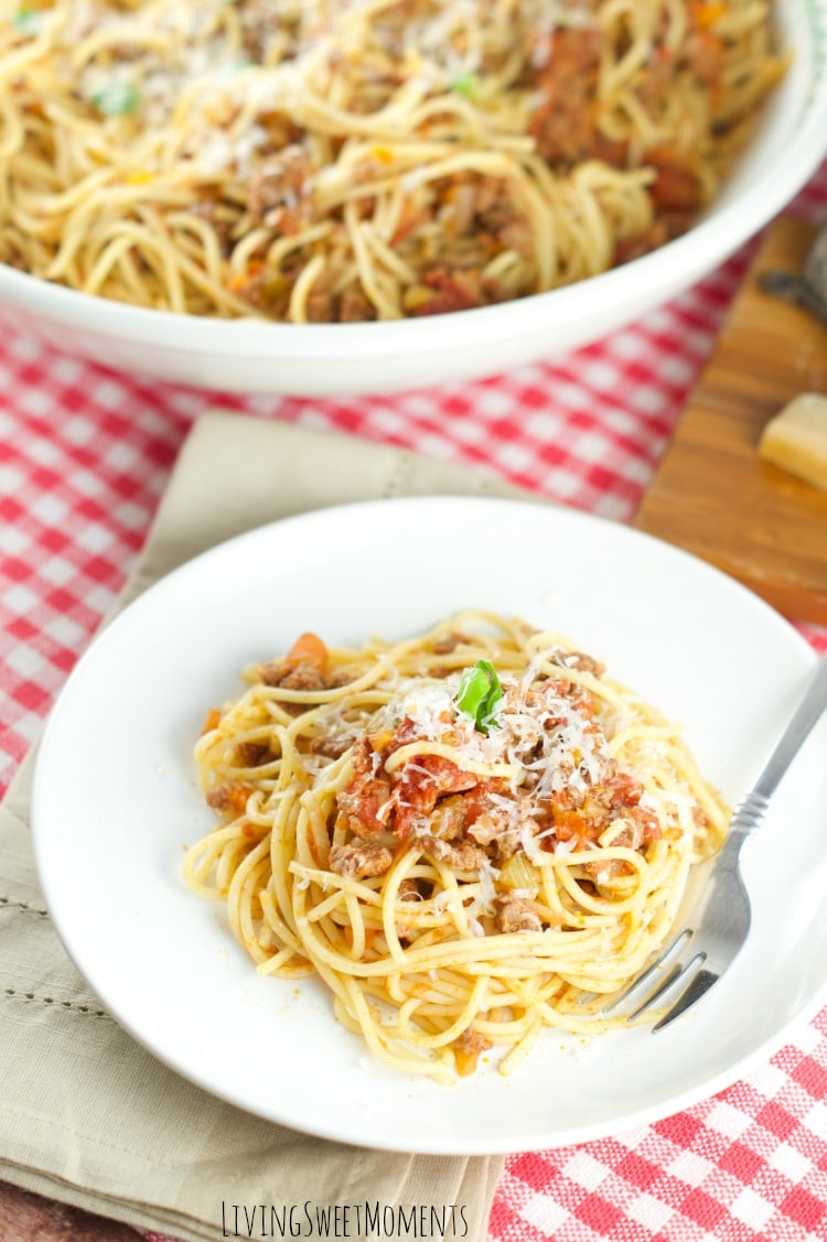 This amazing Spaghetti with meat sauce is the perfect quick weeknight dinner idea that your whole family will love. Enjoy a nice rich Italian sauce at home. 