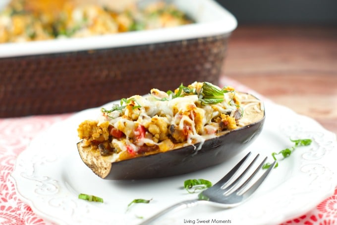 Turkey Stuffed Eggplant - Delicious lean turkey mixed with veggies and tomato sauce serve inside roasted eggplants and topped with cheese. Yummy lean recipe