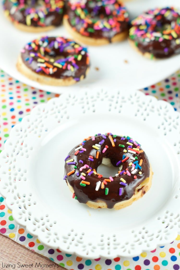 chocolate glazed baked donuts - this delicious dessert is easy to make and perfect for parties and celebrations. Donuts are baked and glazed with chocolate.