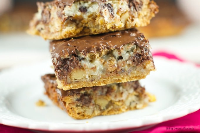 Hello Dolly Bars: these magic bars are made a graham cracker crust, chocolate chips, walnuts, cereal, coconut and more. Perfect dessert for any holiday or get together!