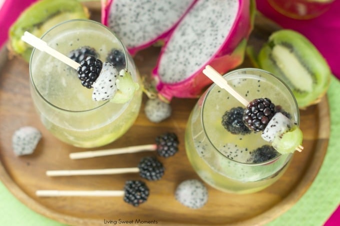 Tropical Moscato Sangria: delicious bubbly moscato with chunks of kiwi, dragon fruit and blackberries. The perfect summer cocktail drink for summer parties.