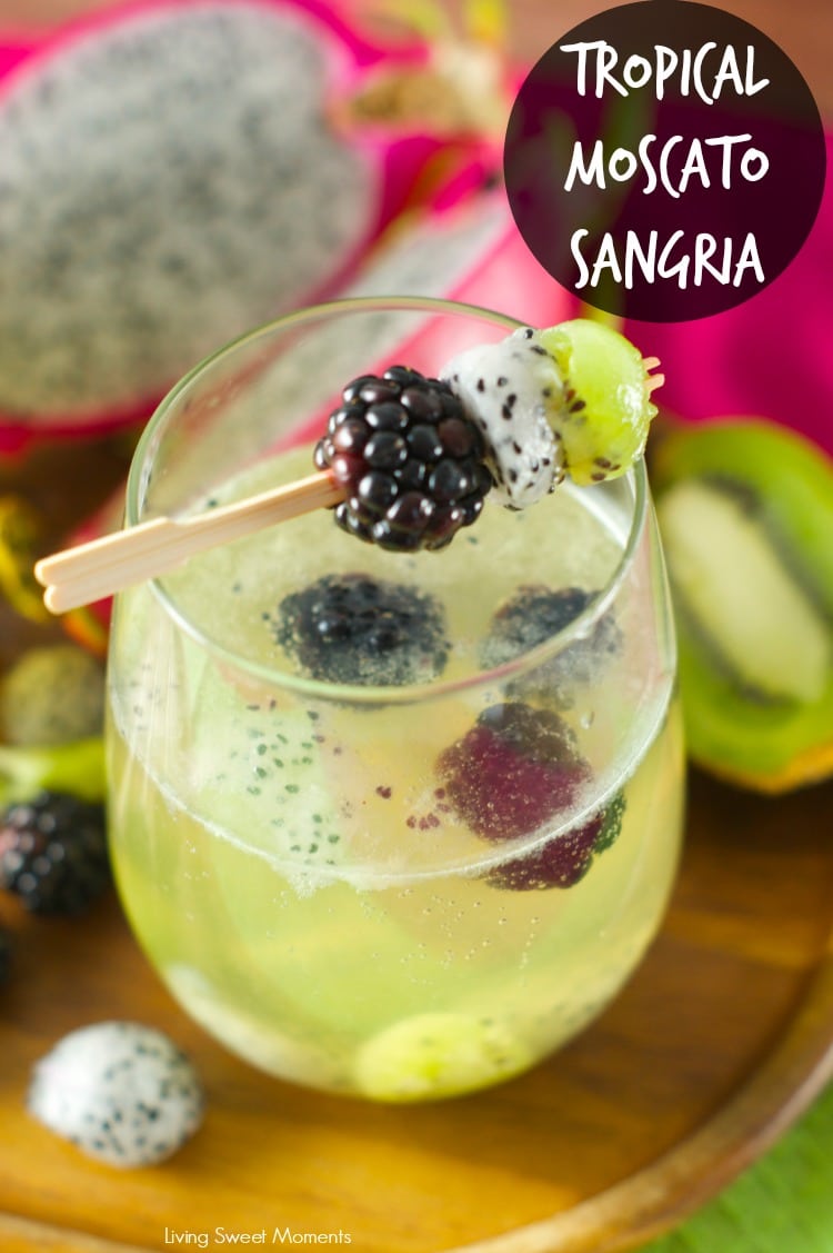 Tropical Moscato Sangria: delicious bubbly moscato with chunks of kiwi, dragon fruit and blackberries. The perfect summer cocktail drink for summer parties.