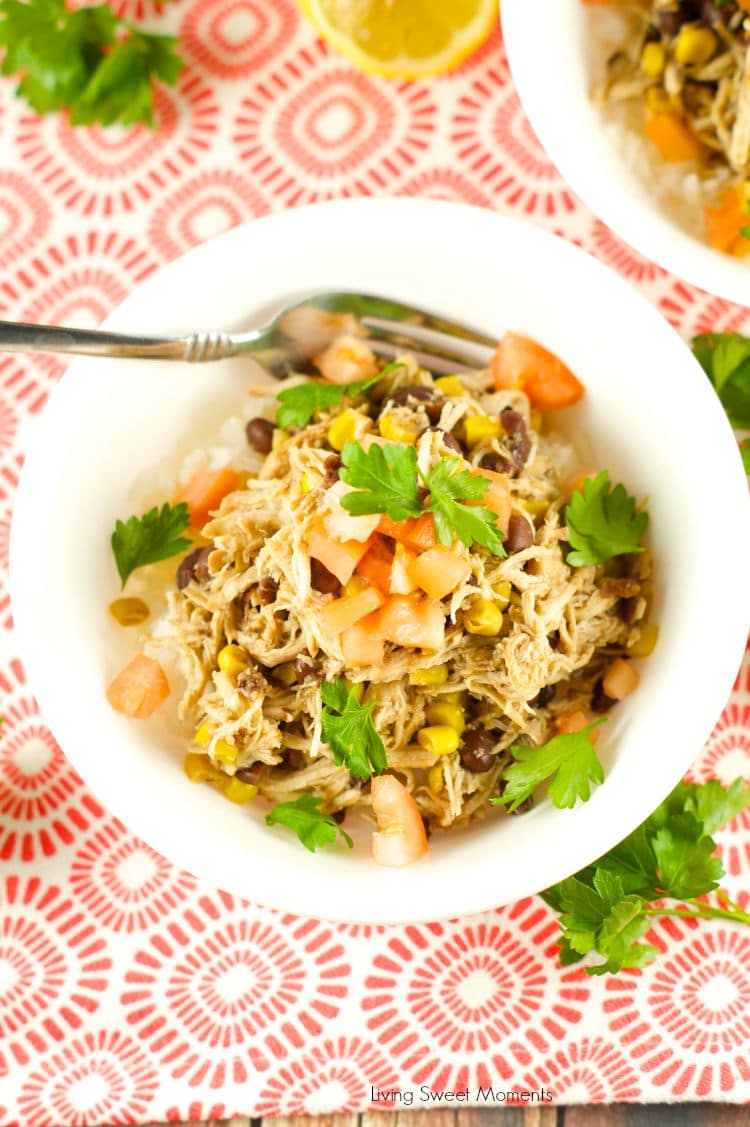 Slow Cooker Chicken And Black Beans - Delicious chicken is slow cooked in beans, corn, salsa verde and spices. Enjoy over rice or as a burrito bowl. Perfect weeknight dinner idea! 