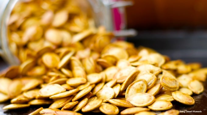 Roasted Pumpkin Seeds - don't know what to do with the seeds after you carve that pumpkin? Create a a healthy crunchy snack with the seeds. Easy and delish!