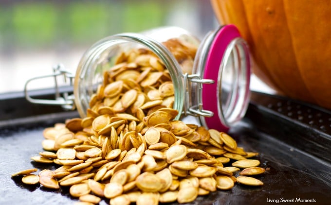 Roasted Pumpkin Seeds - don't know what to do with the seeds after you carve that pumpkin? Create a a healthy crunchy snack with the seeds. Easy and delish!