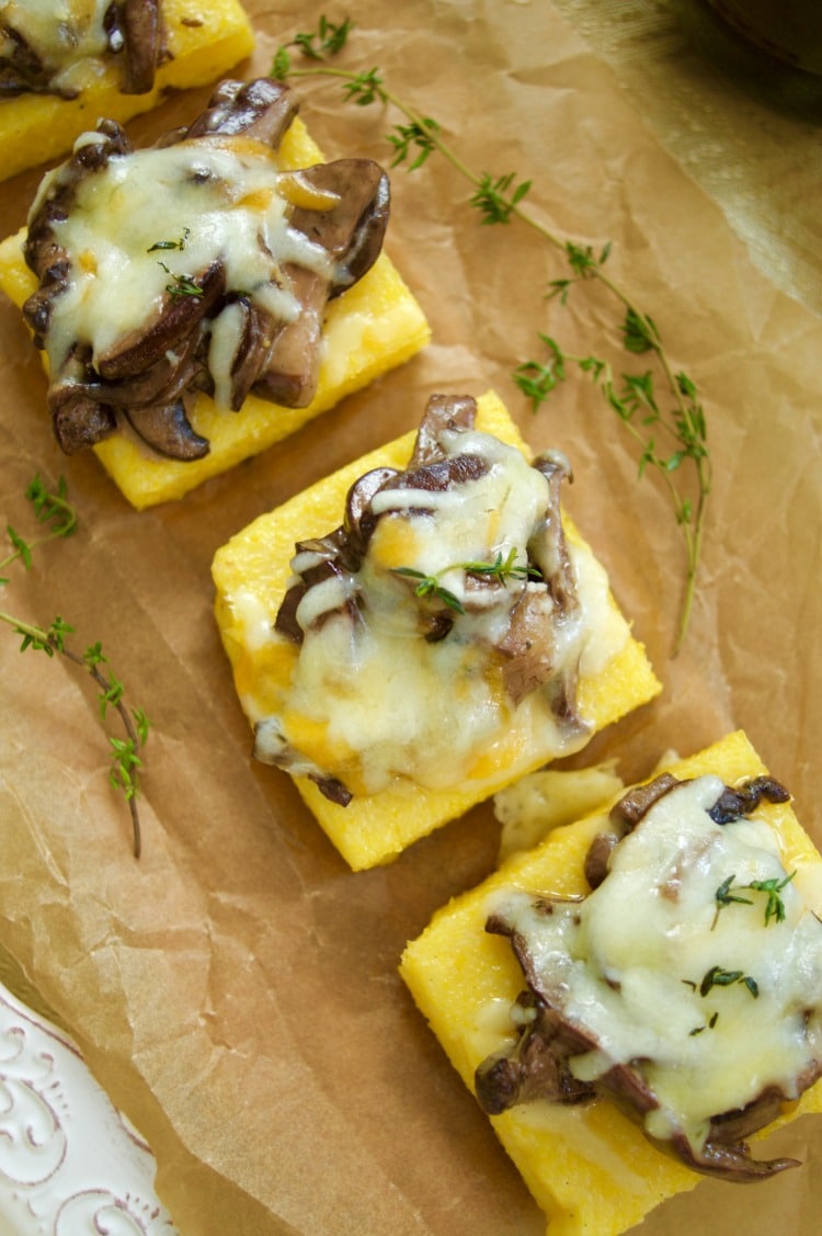 Delicious cheesy mushroom ragu served over polenta squares. A quick and easy vegetarian entree or appetizer idea. Sophisticated taste without the fuss!