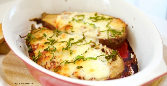 This delicious Cheesy Stuffed Eggplant Recipe is easy to make, vegetarian and very cheesy. The eggplant is roasted for extra flavor. Perfect as a side dish. 