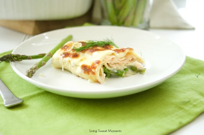 This easy & delicious Salmon Lasagna Recipe is made with flaky salmon and asparagus. Then is baked in a dilly Bechamel sauce. Perfect for weeknight dinner. 