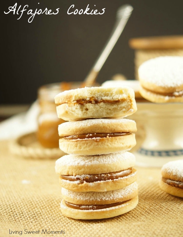 Alfajores Recipe - they are delicate shortbread cookies filled with dulce de leche. These cookies use cornstarch as a main ingredient. Great with coffee!