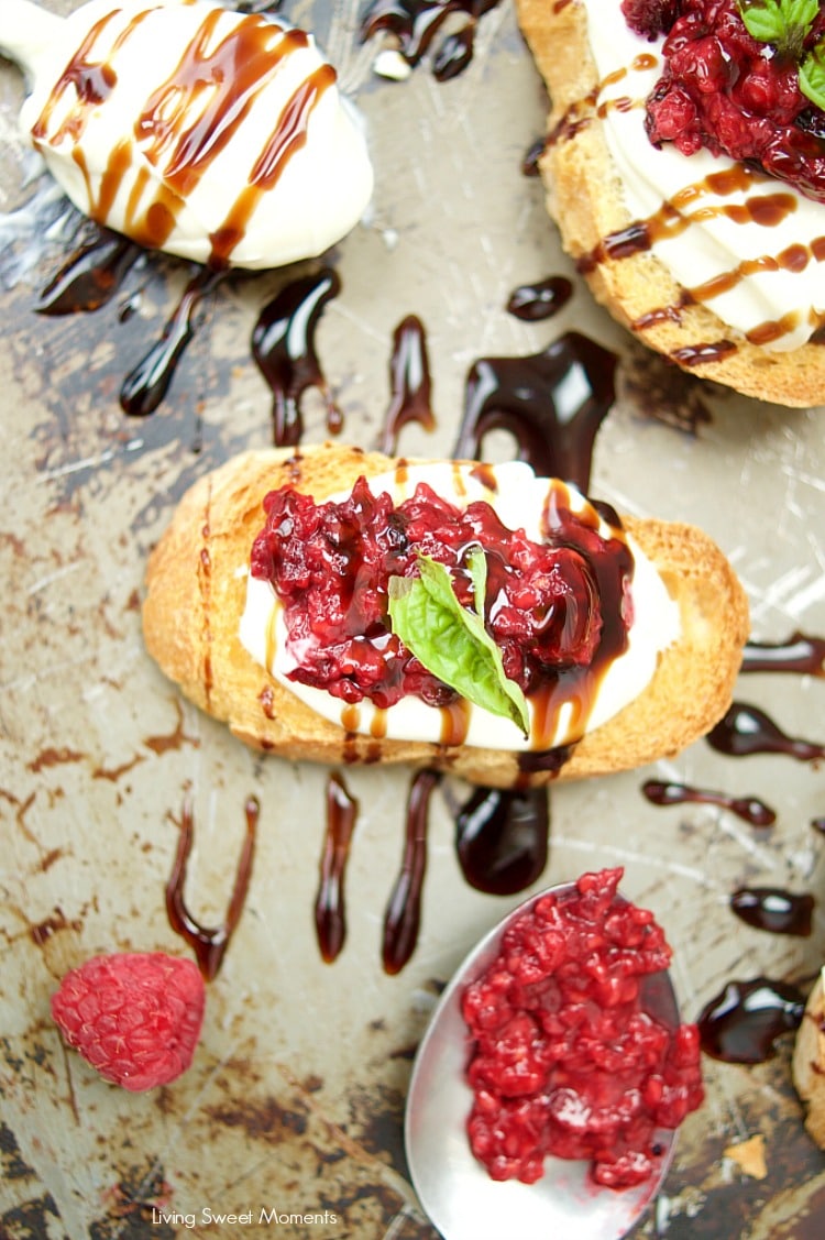 This delicious Roasted Raspberry Crostini recipe is made with balsamic vinegar, mascarpone cheese on top of a baguette. The perfect summer appetizer.