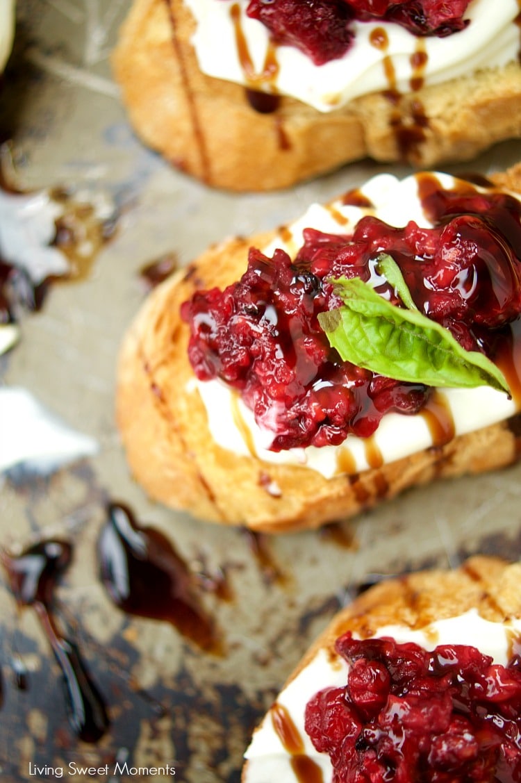 This delicious Roasted Raspberry Crostini recipe is made with balsamic vinegar, mascarpone cheese on top of a baguette. The perfect summer appetizer.