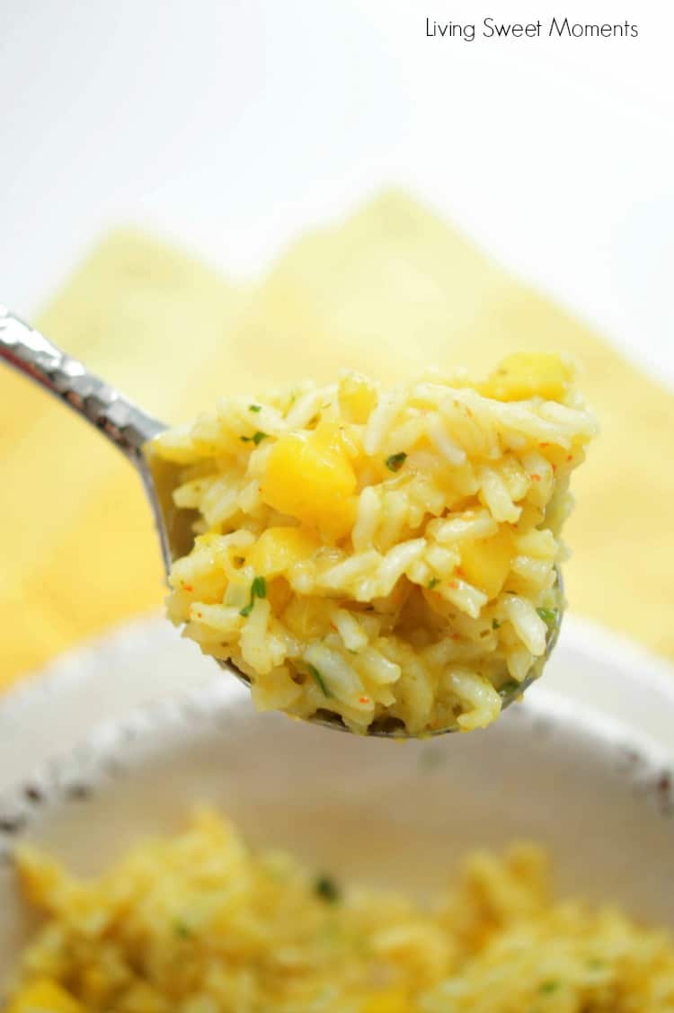 This Spicy Mango Rice recipe is easy to make and delicious. The perfect side dish to any dinner or for entertaining. Made with chili, cilantro, lime & mango