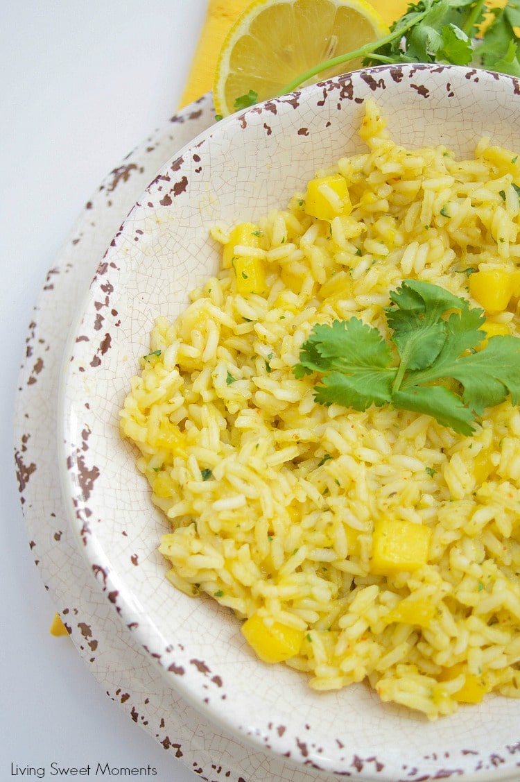 This Spicy Mango Rice recipe is easy to make and delicious. The perfect side dish to any dinner or for entertaining. Made with chili, cilantro, lime & mango