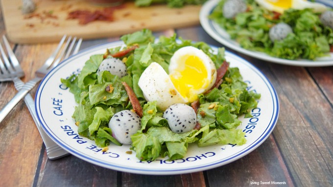 This amazing French Lyonnaise Salad Recipe is easy to make & delicious. Enjoy greens, bacon & fruit tossed with a mustard vinaigrette & a soft boiled egg.