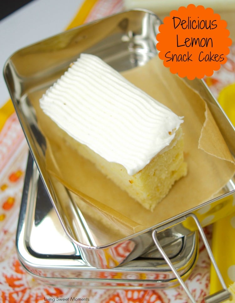 These scrumptious from scratch Lemon Snack Cakes are filled with lemon creme and topped with lemon frosting. Perfect recipe for dessert or the lunchbox. 