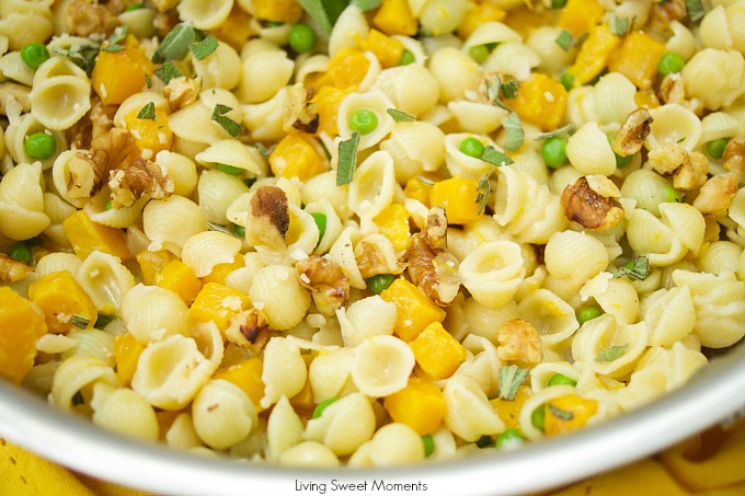 This creamy Mac And Cheese recipe is inspired by fall featuring butternut squash, peas, sage, and walnuts. The perfect easy 30-minute weeknight dinner idea. Vegetarian too! 