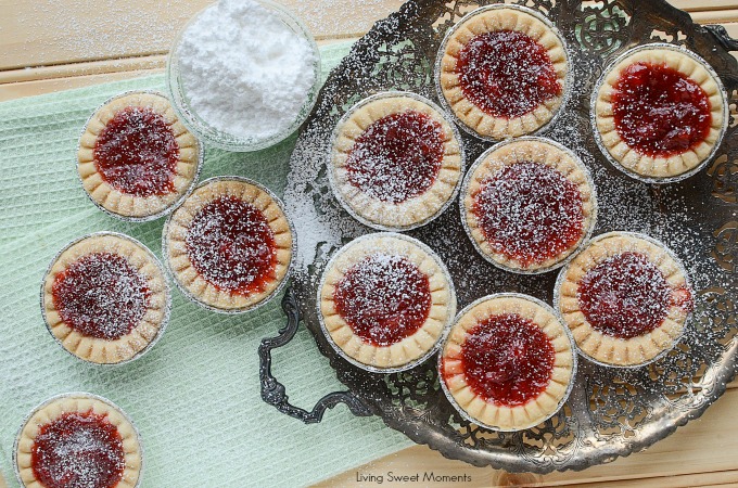 These delicious and tangy Strawberry Rhubarb Tarts are super easy to make and are the perfect mini desserts for any party. Top them with powdered sugar.