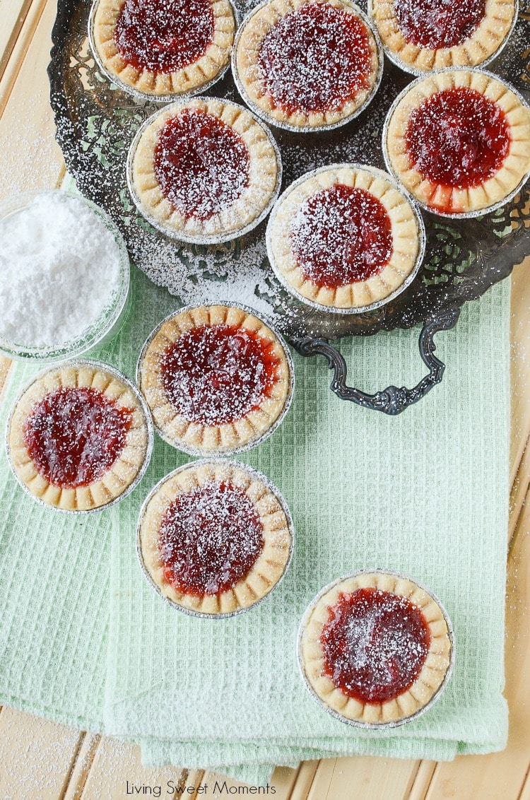 These delicious and tangy Strawberry Rhubarb Tarts are super easy to make and are the perfect mini desserts for any party. Top them with powdered sugar.