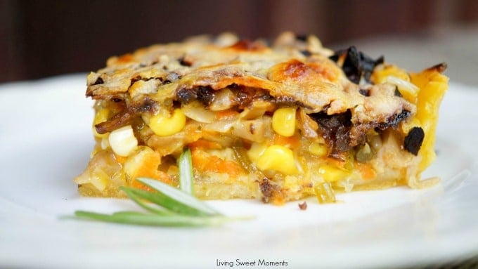 This delicious Summer Vegetable Tart recipe is filled with corn, shallots, mushrooms, creme fraiche and shredded gruyere cheese. A perfect vegetarian entree