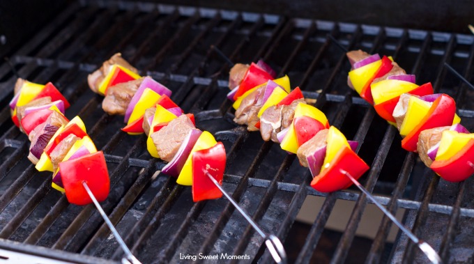 Marinated Beef Kabobs Recipe: delicious grilled beef and veggies served over a bed of rice. Perfect quick dinner idea for a weeknight or a get together.