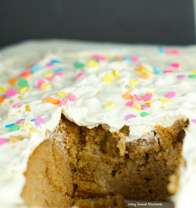 Tapioca Spiced Poke Cake - Spice cake is drenched with creamy tapioca pudding and then topped with cream cheese frosting. Perfect and easy dessert for parties and get togethers. More on www.livingsweetmoments.com