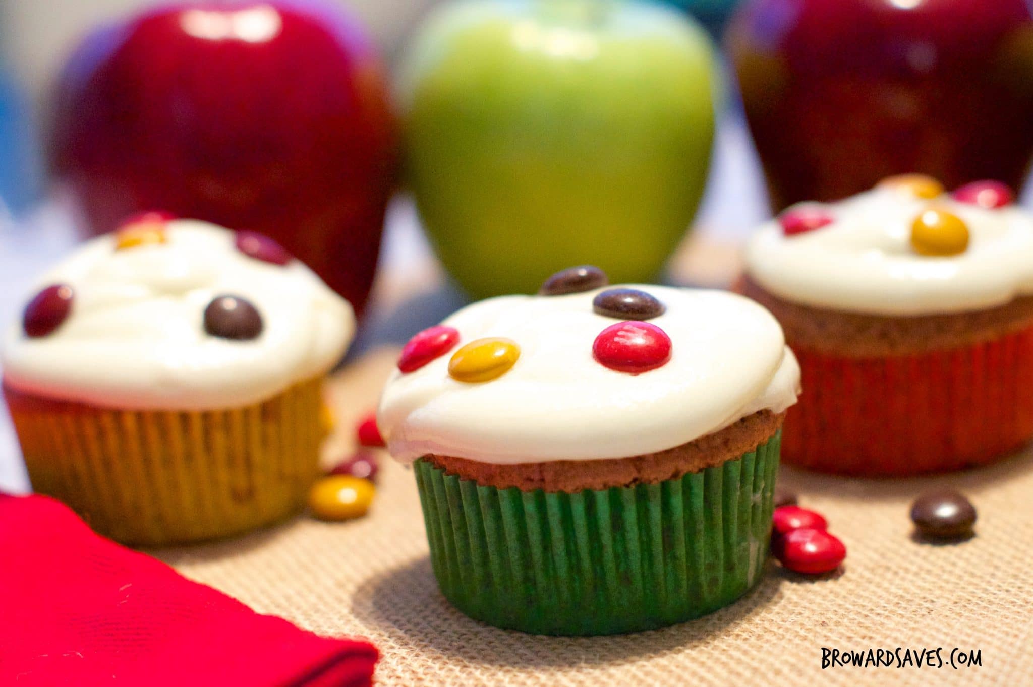 This amazing apple chocolate spiced cupcakes are topped with homemade cider frosting and delicious m&m's. The perfect kid-friendly dessert for fall!