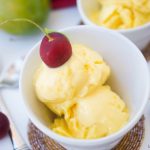 This creamy homemade mango frozen yogurt recipe only requires 3 ingredients to make and no ice cream machine needed. A perfect summer dessert for a hot day