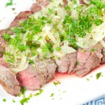 Easy Flank Steak Recipe made in 10 minutes with a tangy wine and mustard sauce. Easy enough to make on a weeknight and elegant enough to serve with company.