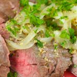 Easy Flank Steak Recipe made in 10 minutes with a tangy wine and mustard sauce. Easy enough to make on a weeknight and elegant enough to serve with company.