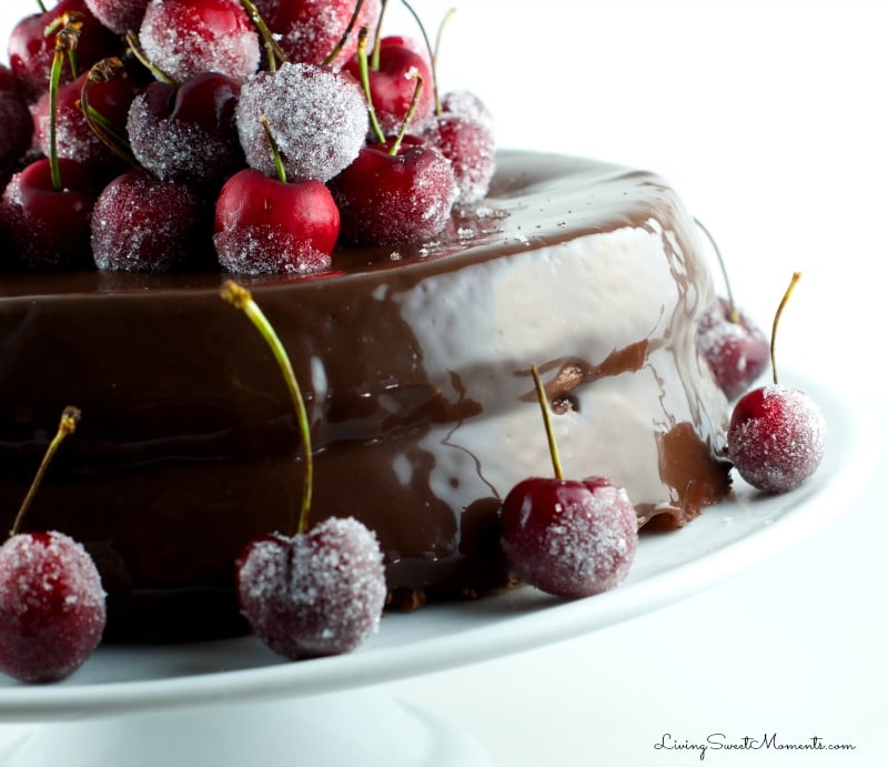 This spectacular Chocolate Cake Recipe with frosted cherries will not disappoint. The cake is chocolate with chocolate ganache and some snowed cherries. Yum