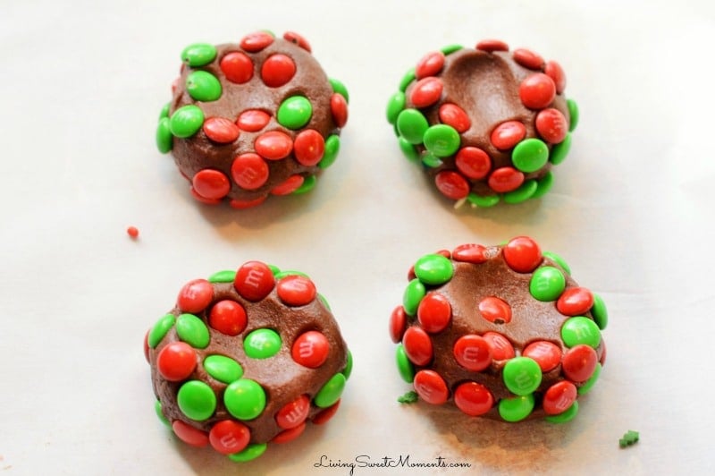 Delicious Chocolate Blossom Cookies made with M&M's and Chocolate Kisses! Easy to make and delicious. The cookies are soft on the inside and crunchy outside