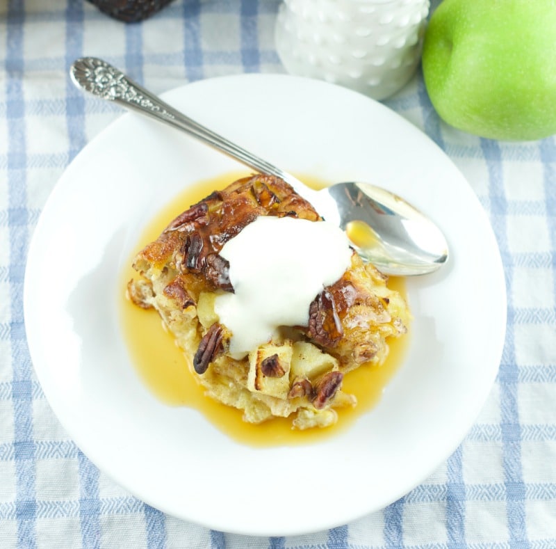 This delicious Cinnamon Apple bake with Orange Maple Glaze recipe is made with refrigerated cinnamon rolls. The perfect easy breakfast or brunch idea!