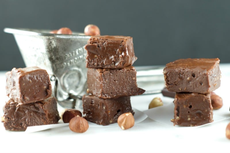 This nutty Nutella Fudge Recipe is easy to make and decadent. Enjoy a soft, chewy texture that melts in your mouth. The perfect gluten free Holiday dessert.