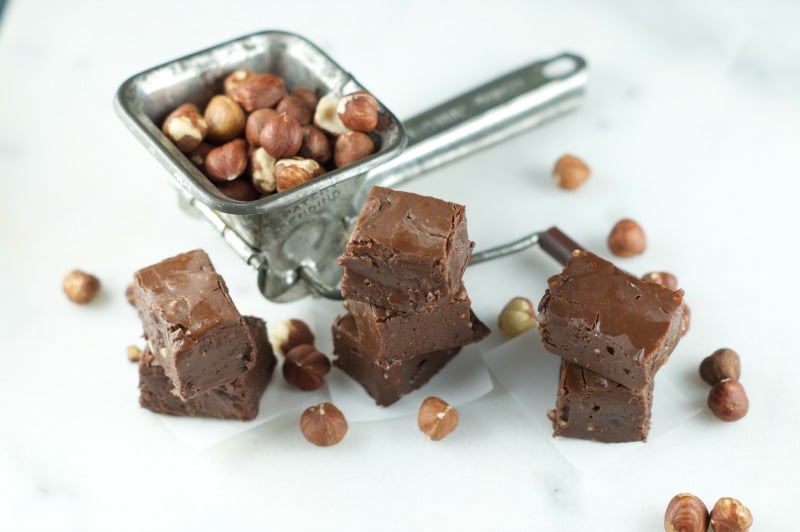 This nutty Nutella Fudge Recipe is easy to make and decadent. Enjoy a soft, chewy texture that melts in your mouth. The perfect gluten free Holiday dessert.