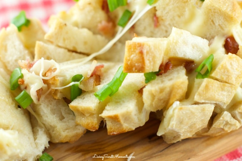 This delicious cheesy bacon Pull Apart Bread Recipe is so easy to make with oozy brie and smoked bacon. The perfect appetizer for the Superbowl. My favorite!
