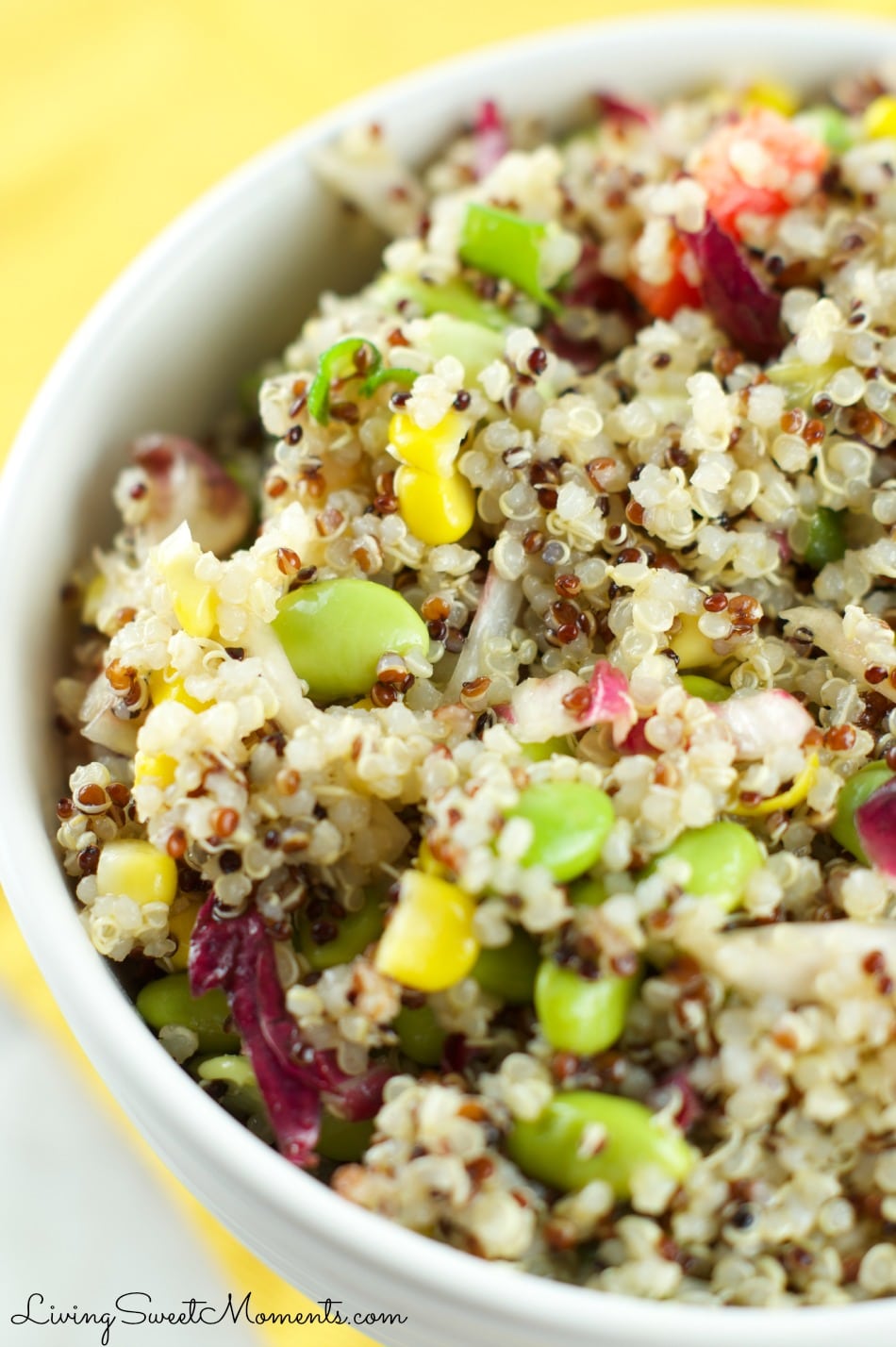 This fresh Quinoa Edamame Salad Recipe is colorful, crunchy and delicious. Served with an Asian-inspired vinaigrette and lots of veggies. Low fat and tasty