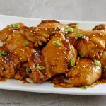 Asian Glazed Chicken Thighs - This easy dinner recipe requires only a few ingredients and is perfect to serve over rice. Perfect quick weeknight dinner idea