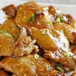 Asian Glazed Chicken Thighs - This easy dinner recipe requires only a few ingredients and is perfect to serve over rice. Perfect quick weeknight dinner idea