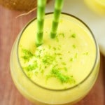 Mango Coconut Smoothie - Delicious 3 ingredient smoothie. Enjoy tropical flavors in a decadent thick smoothie that takes just seconds to make. Perfect breakfast or afternoon snack.