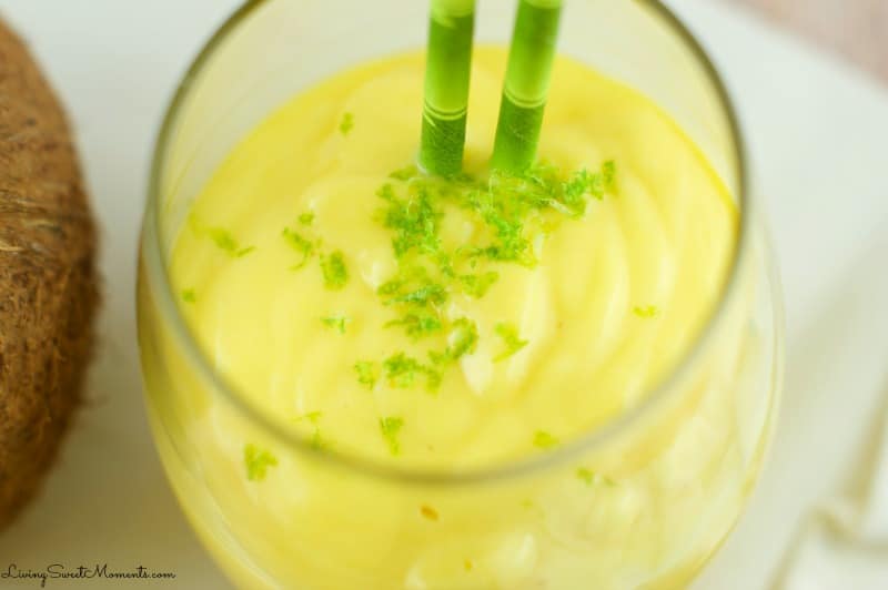 Mango Coconut Smoothie - Delicious 3 ingredient smoothie. Enjoy tropical flavors in a decadent thick smoothie that takes just seconds to make. Perfect breakfast or afternoon snack.